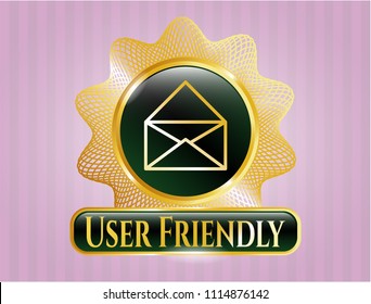  Gold badge or emblem with envelope icon and User Friendly text inside