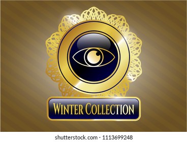  Gold badge or emblem with eye icon and Winter Collection text inside