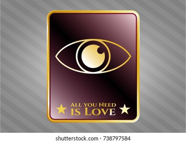  Gold badge or emblem with eye icon and All you Need is Love text inside