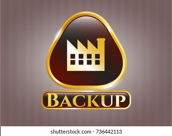  Gold badge or emblem with factory icon and Backup text inside