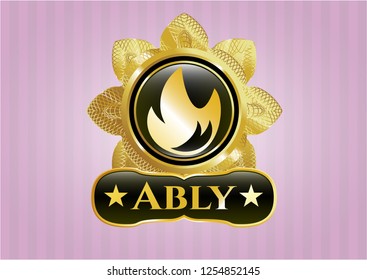  Gold badge or emblem with fire icon and Ably text inside