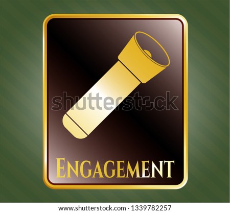  Gold badge or emblem with flashlight icon and Engagement text inside