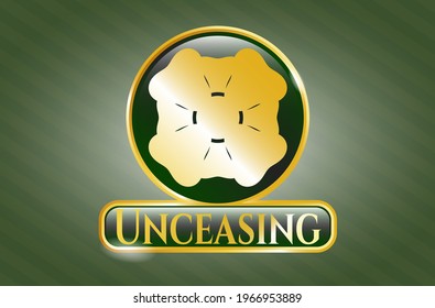 Gold badge or emblem with four leaf clover icon and Unceasing text inside