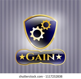  Gold badge or emblem with gear, team work icon and Gain text inside