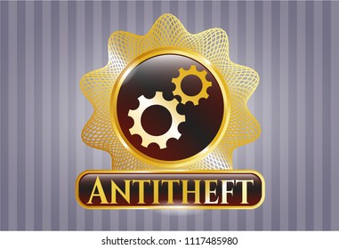  Gold badge or emblem with gear, team work icon and Antitheft text inside
