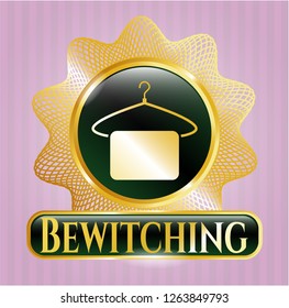  Gold badge or emblem with hanger with towel icon and Bewitching text inside