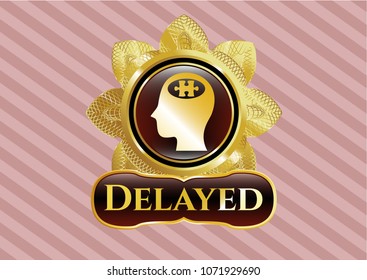   Gold badge or emblem with head with jigsaw puzzle piece icon and Delayed text inside