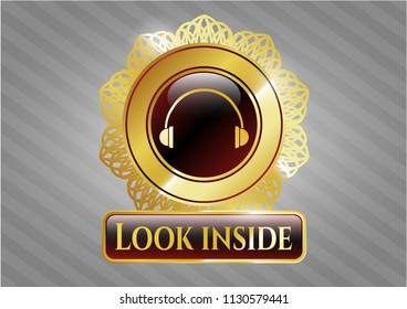  Gold badge or emblem with headphones icon and Look inside text inside