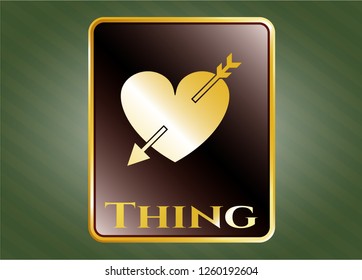  Gold badge or emblem with heart with arrow icon and Thing text inside