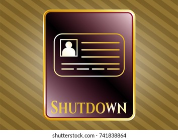  Gold badge or emblem with identification card icon and Shutdown text inside