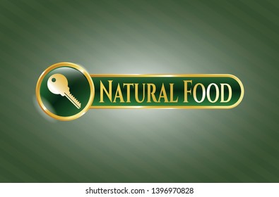  Gold badge or emblem with key icon and Natural Food text inside