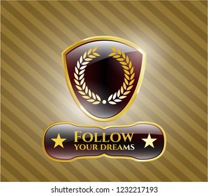  Gold badge or emblem with laurel wreath icon and Follow your dreams text inside