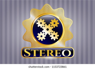  Gold badge or emblem with mechanism icon and Stereo text inside