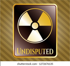  Gold badge or emblem with nuclear, radioactive icon and Undisputed text inside