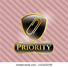  Gold badge or emblem with paper clip icon and Priority text inside