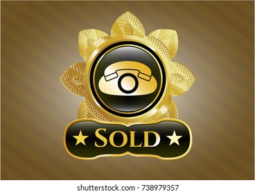  Gold badge or emblem with phone icon and Sold text inside