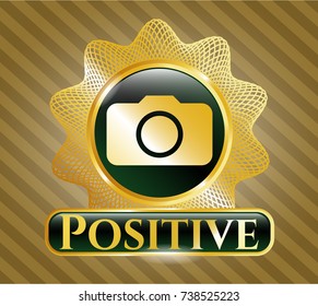  Gold badge or emblem with photo camera icon and Positive text inside