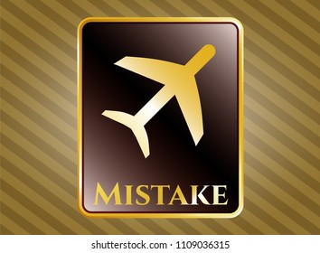  Gold badge or emblem with plane icon and Mistake text inside