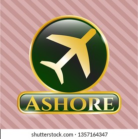 Gold badge or emblem with plane icon and Ashore text inside