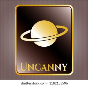  Gold badge or emblem with planet, saturn icon and Uncanny text inside
