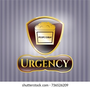  Gold badge or emblem with popcorn icon and Urgency text inside