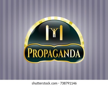  Gold badge or emblem with pull up icon and Propaganda text inside