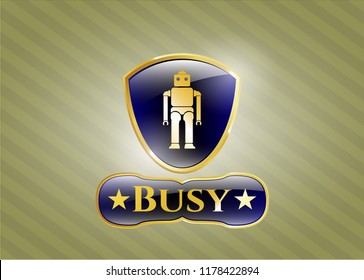  Gold badge or emblem with robot icon and Busy text inside