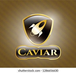 Gold badge or emblem with rocket icon and Caviar text inside