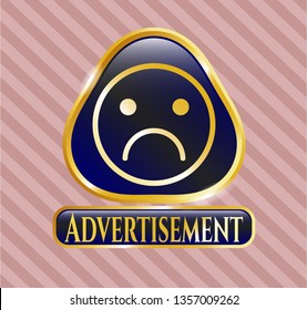  Gold badge or emblem with sad face icon and Advertisement text inside