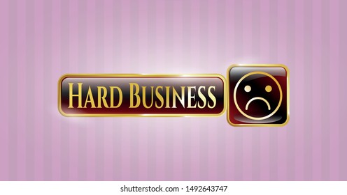  Gold badge or emblem with sad face icon and Hard Business text inside