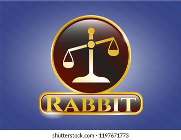 Gold badge or emblem with scale icon and Rabbit text inside