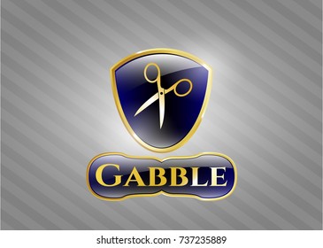  Gold badge or emblem with scissors icon and Gabble text inside