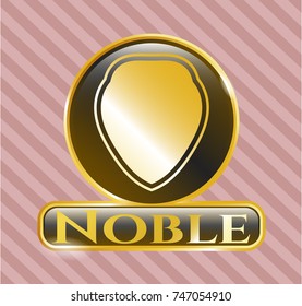  Gold badge or emblem with shield icon and Noble text inside