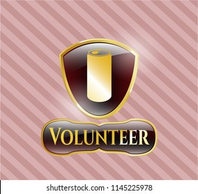  Gold badge or emblem with soda can icon and Volunteer text inside
