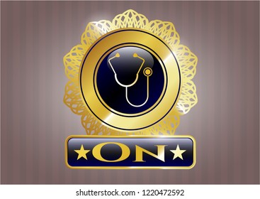  Gold badge or emblem with stethoscope icon and On text inside