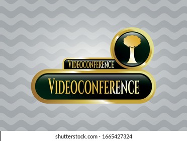  Gold badge or emblem with tree icon and Video conference text inside