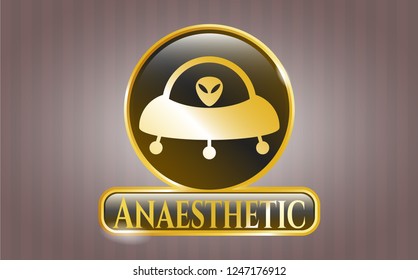  Gold badge or emblem with ufo with aline inside icon and Anaesthetic text inside