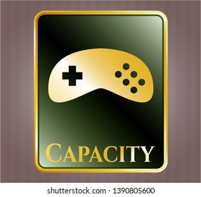  Gold badge or emblem with video game icon and Capacity text inside