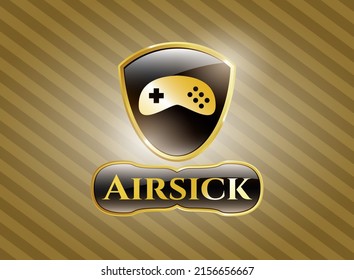 Gold badge or emblem with video game icon and Airsick text inside