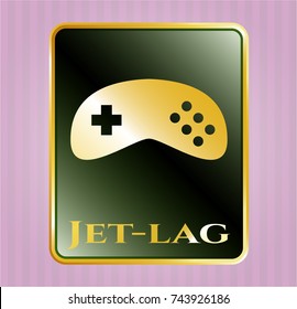  Gold badge or emblem with video game icon and Jet-lag text inside
