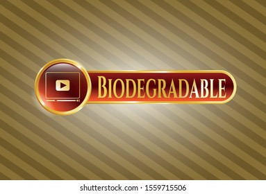  Gold badge or emblem with video player icon and Biodegradable text inside