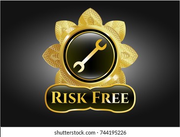  Gold badge or emblem with wrench icon and Risk Free text inside