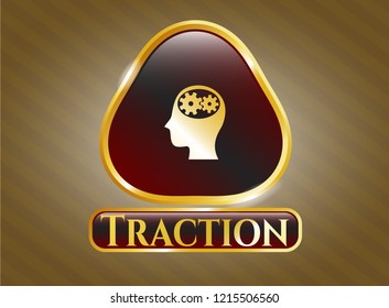  Gold badge with head with gears inside icon and Traction text inside