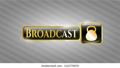  Gold badge with kettlebell icon and Broadcast text inside