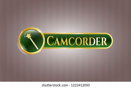 Gold badge with magic stick icon and Camcorder text inside