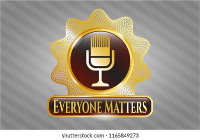  Gold badge with microphone icon and Everyone Matters text inside