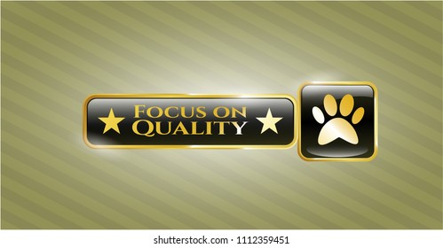   Gold badge with paw icon and Focus on Quality text inside