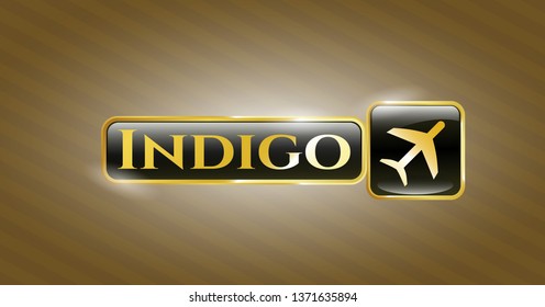  Gold badge with plane icon and Indigo text inside