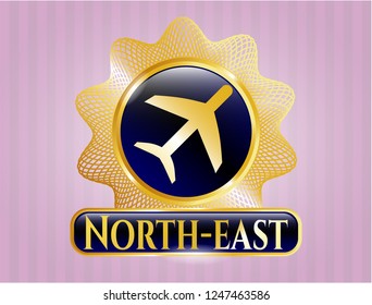  Gold badge with plane icon and North-east text inside