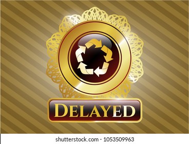  Gold badge with recycle icon and Delayed text inside